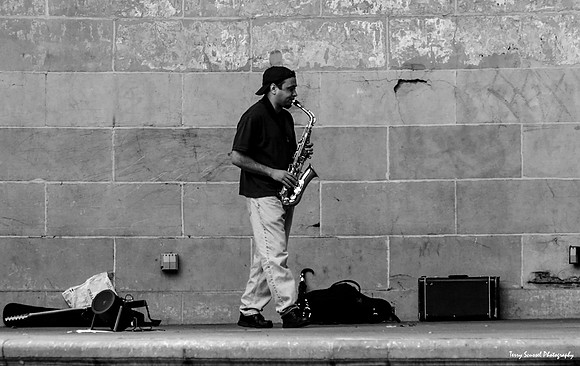 Saxophonist- City street, NYC (B&W)