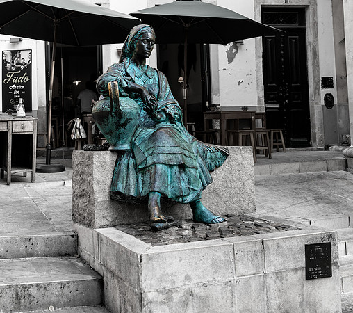 Bronze Statue of woman carrying water, Mercado Central de Santiago, Coimbra