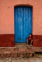 Boy in Blue Door