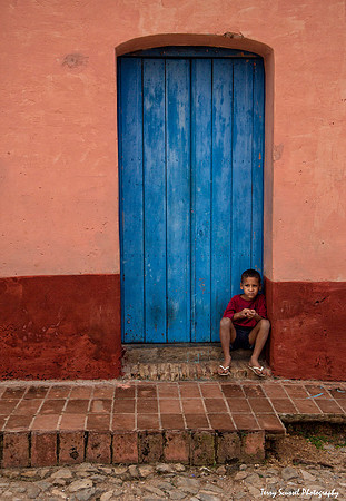Boy in Blue Door
